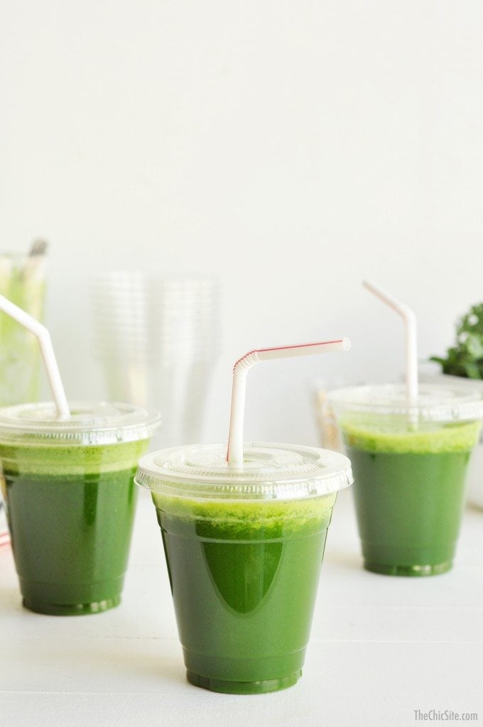 green juice in plastic cups
