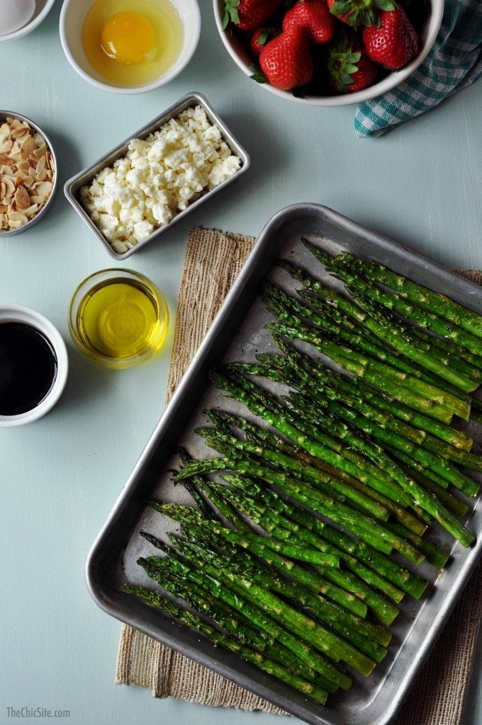 roasted asparagus on a baking sheet